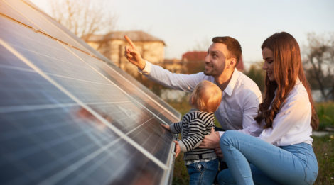 Family viewing solar panels